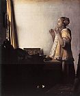 Woman with a Pearl Necklace by Johannes Vermeer